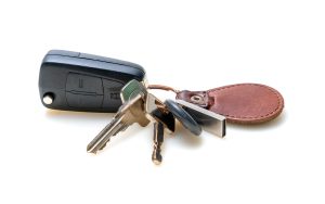 House And Car Keys On White Background
